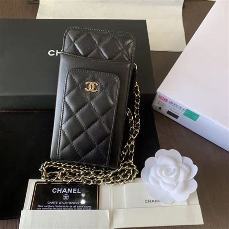 chanel boy phone case|Chanel phone case with chain.